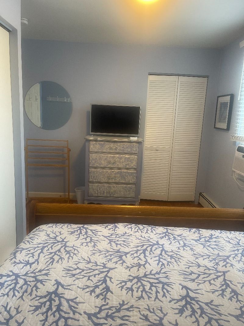 Queen bedroom with Smart TV.