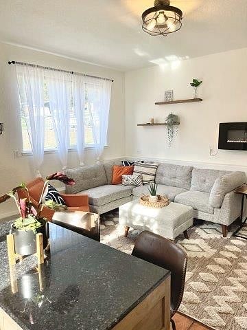 living room with plenty of seating