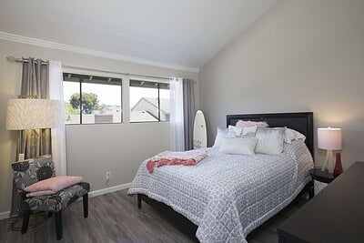 3rd bedroom with queen size bed and a walk in closet