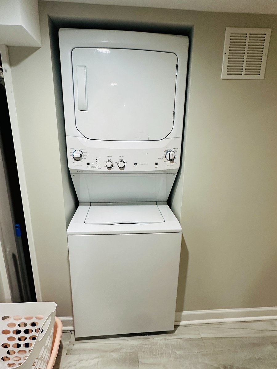 Laundry room accessible through 2nd bedroom bath.