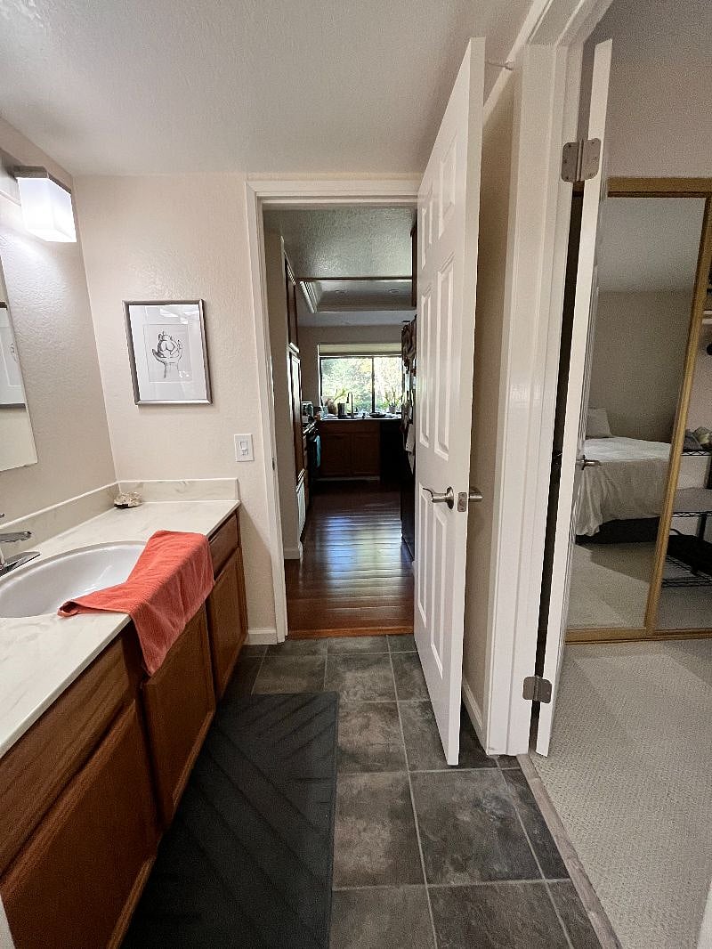 Private Bathroom w/view of kitchen.