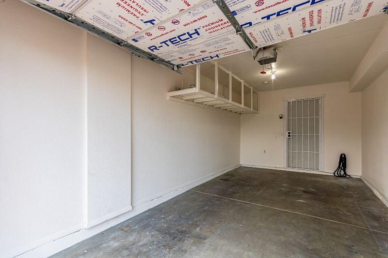 Attached single garage with entrance into kitchen. Insulated for temperature control. Storage.