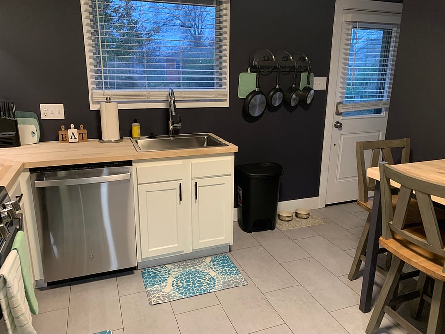 Natural light from the back yard comes in via the over sink window and the back door.