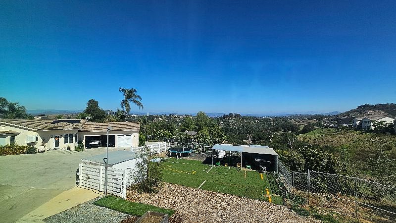 The view from the upstairs second bedroom if you look to the north of our home and the property