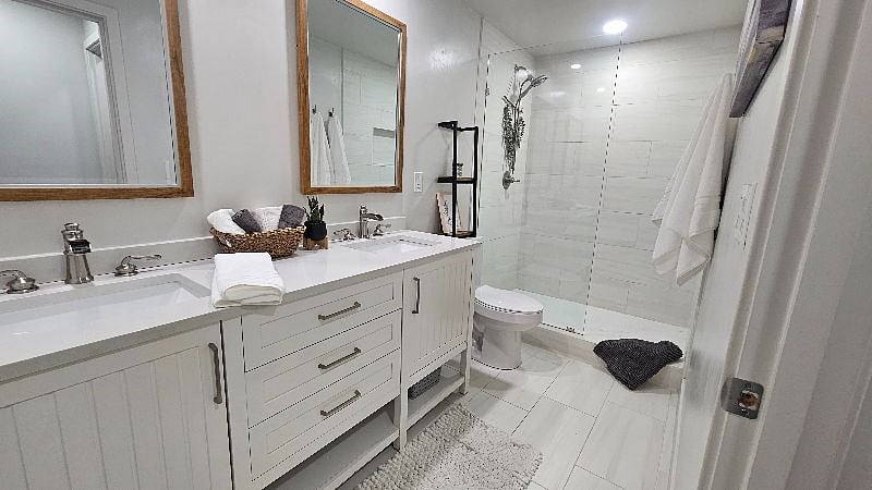 Primary bathroom upstairs by the two bedrooms and loft