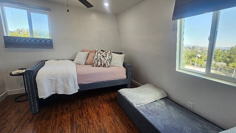 The second bedroom has super comfortable twin daybed with a roll out trundle bed that can fit under the side window if guests are visiting. 