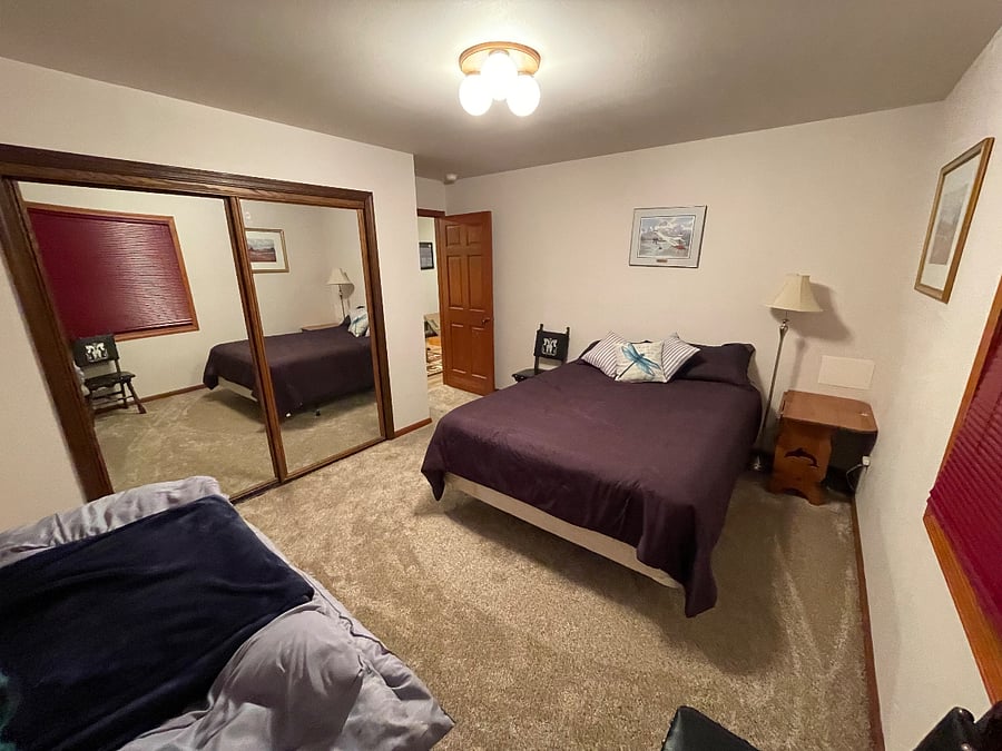 Main down stairs bedroom, Queen bed and large closet.