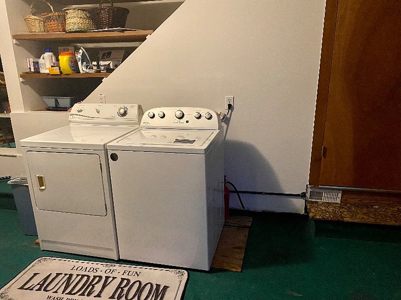 Shared laundry. Theres an extra fridge and storage.
Shared laundry is with single tenant downstairs