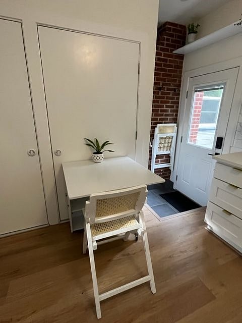 Foldable table on wheels. Easy to move and reconfigure. Can seat 1-4 people and has storage inside.