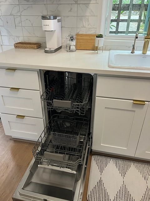 Smaller-sized, (but nice!) Samsung dishwasher.