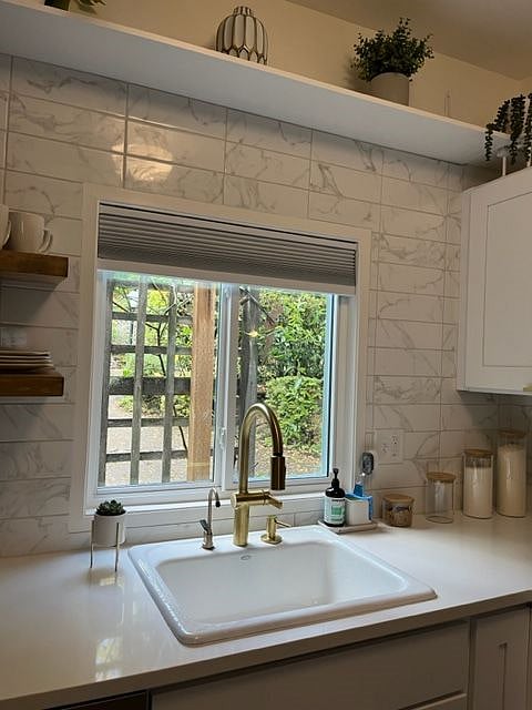 Pull down blackout shade for privacy and sleeping.