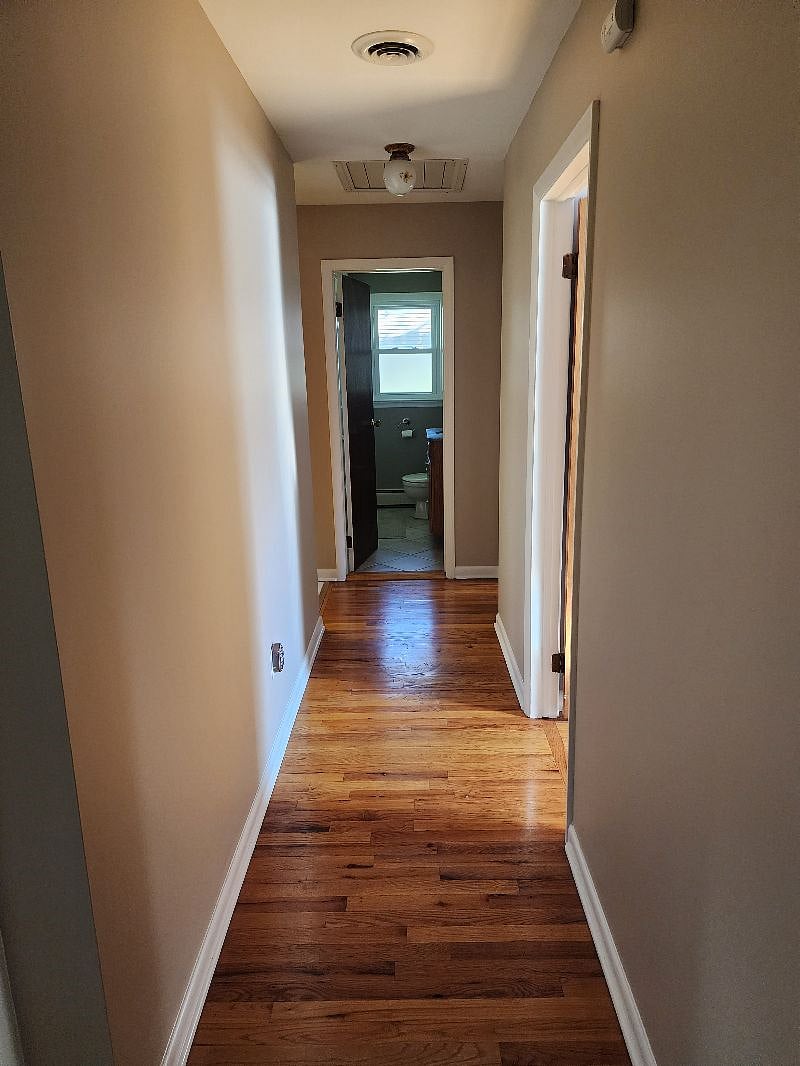 At the end of the hallway is your private bathroom. To its right is your private bedroom. To the left is the kitchen.