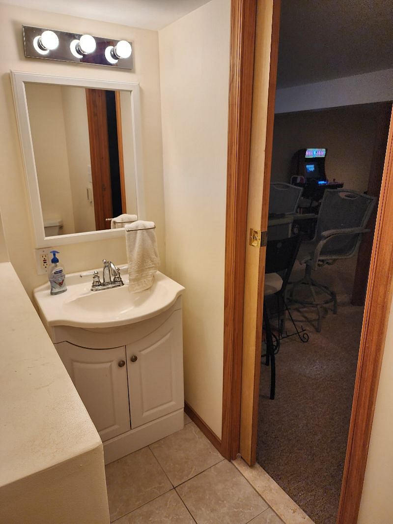 Half bathroom with heated floors in the basement,