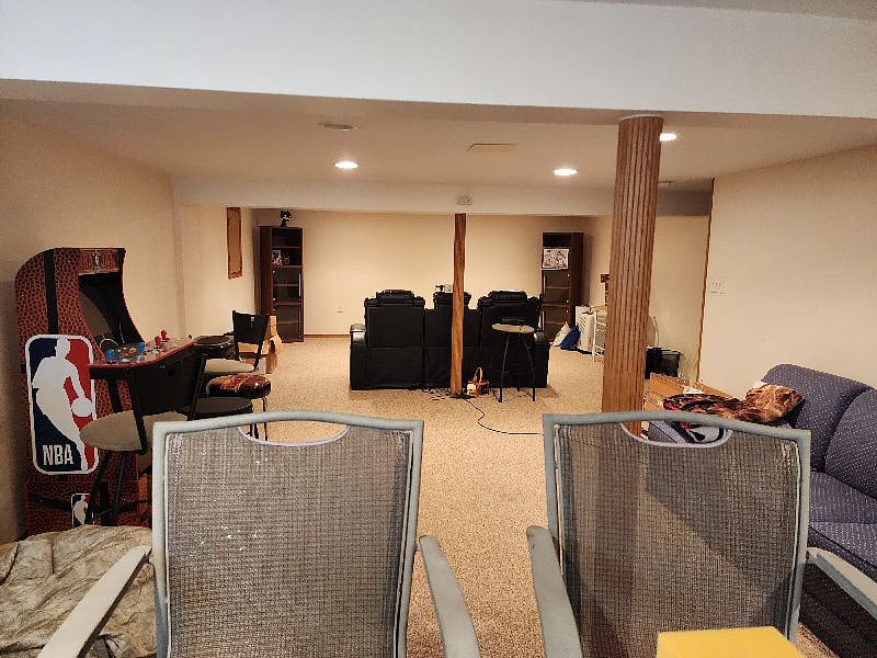 Full basement has an office, bar w/ fridge, a half bathroom, pull-out sofa, and an arcade.