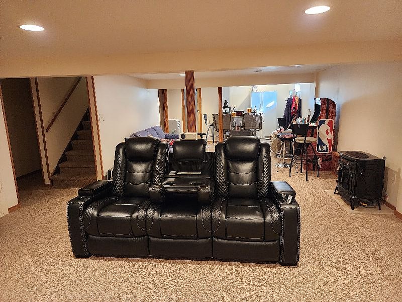 Full basement has an office, bar w/ fridge, a half bathroom, pull-out sofa, and an arcade.