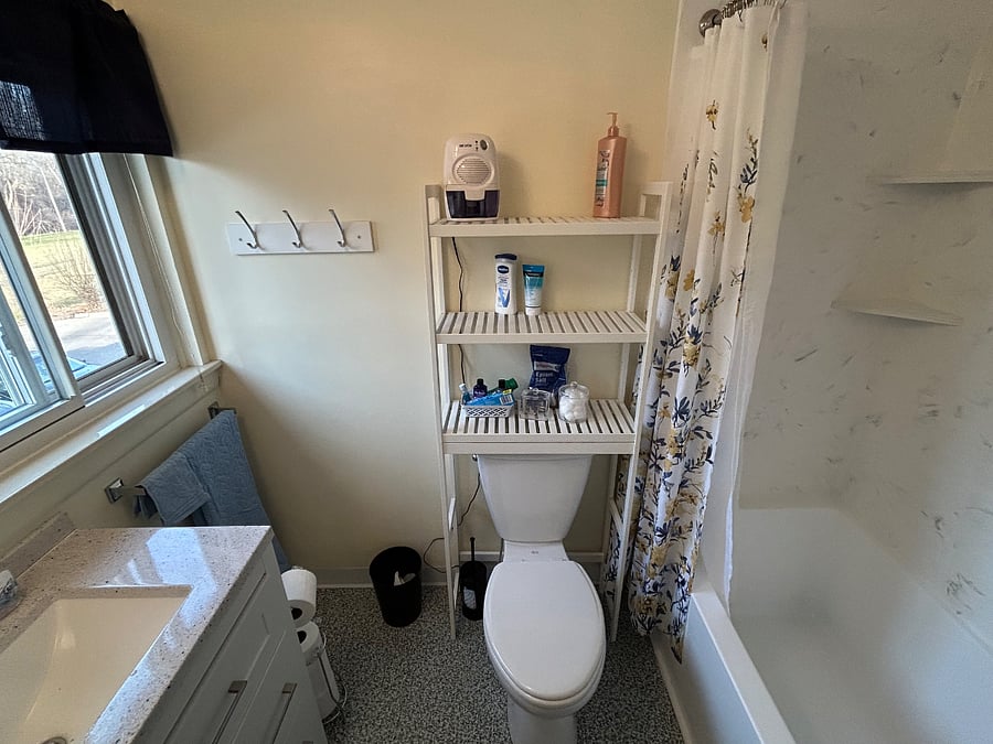 Bathroom has brand new shower and soaker tub, new sink and vanity, and new floor.