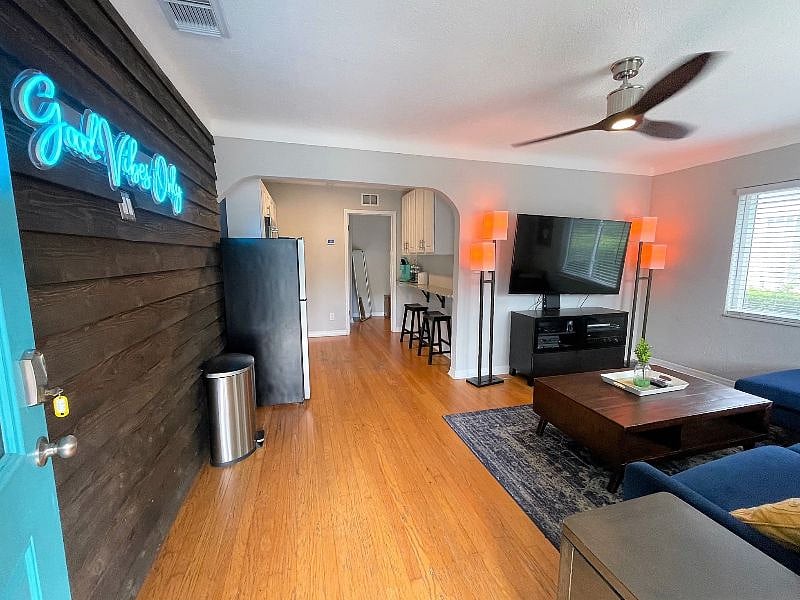 entry to home and living room/ floor plan