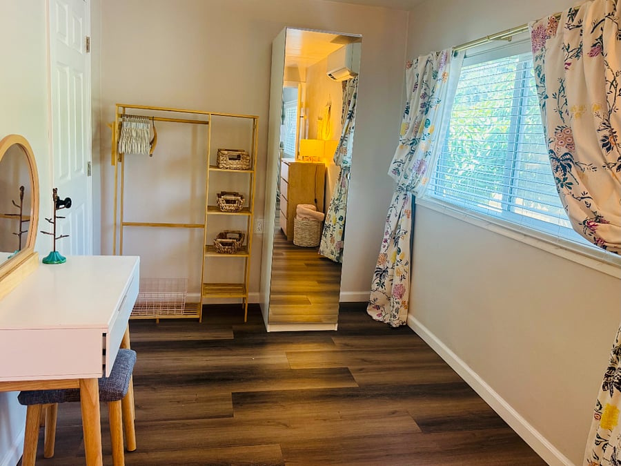 Mirrored utility closet and hanging/storage rack