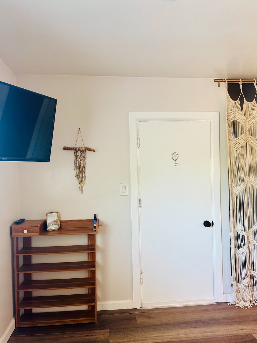 Entrance, shoe storage, and smart TV