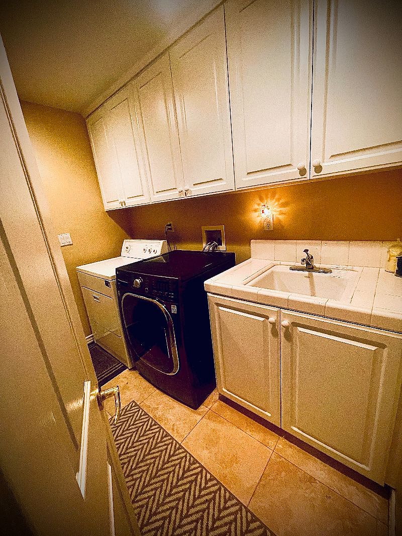Laundry room with washer and dryer.