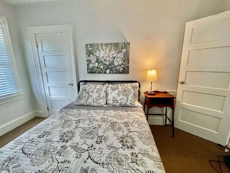 Smaller bedroom with double bed.