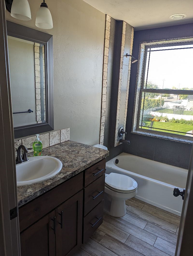 Second bathroom off of kitchen and living room