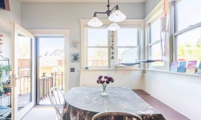 Kitchen nook - enjoy this sunny comfortable place to eat, drink, read and play games. Enjoy.