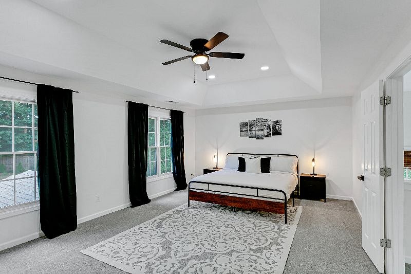 Large primary bedroom with a king bed