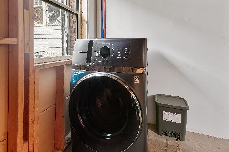 Washer/Dryer in enclosed porch right outside the unit