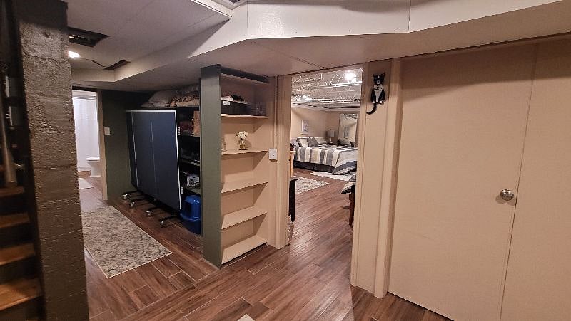 View of bedroom leading to bath area.