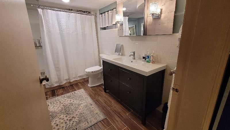 Vanity, shower and storage areas.
