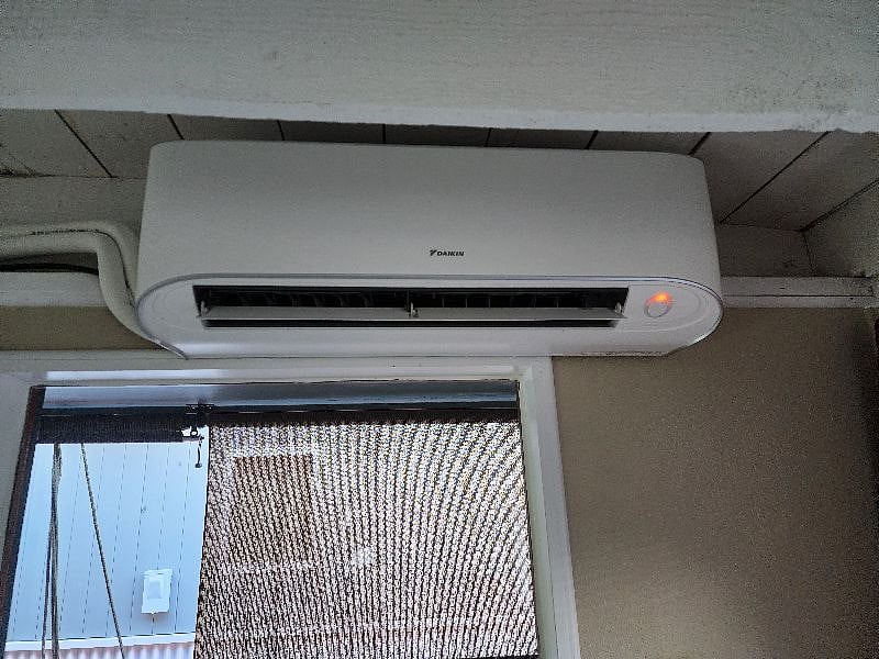 AC and heating unit in room