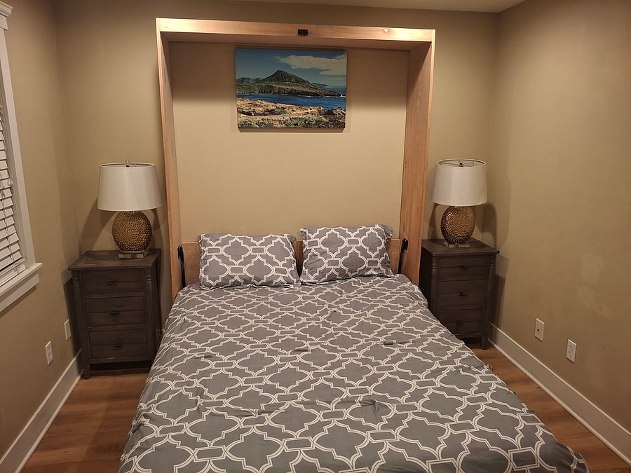 Bedroom #2: Approx 175 sqft bedroom with a slide in closet.  This bedroom has a queen size Murphy bed that can fold up into the wall and provide open space for work, school, and exercise.  