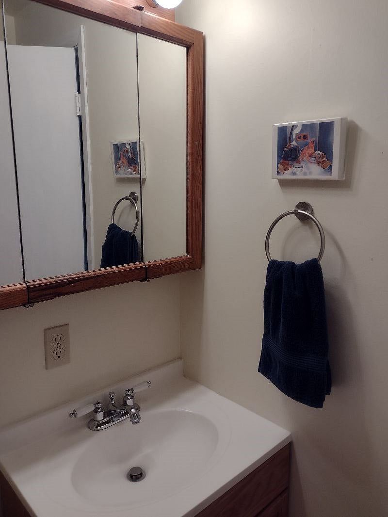 Private, fresh 3/4 bathroom. Frosted double pane window.