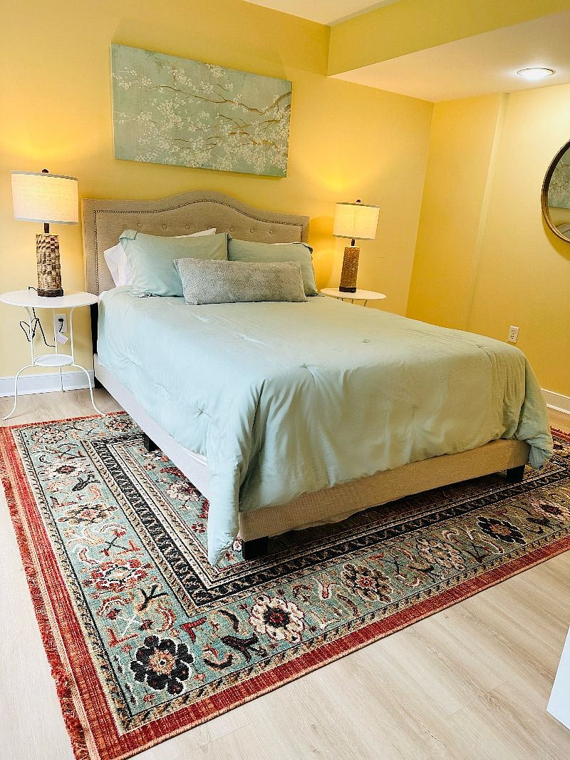 Comfortable bedroom with view of the koi pond.