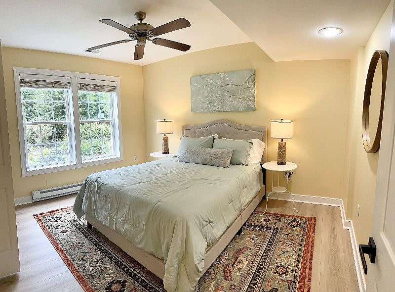 Your bedroom with comfortable bedding and extra memory foam pillows.