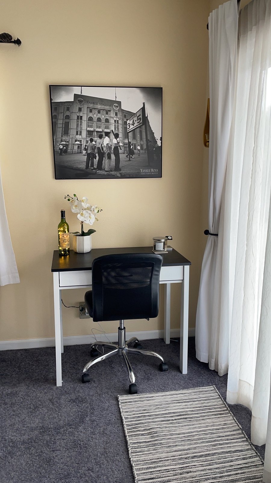 A dedicated desk and comfortable chair.