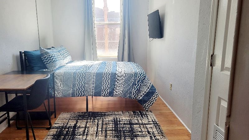 Bedroom with a TV where you can enjoy watching your favorite TV shows and movies, with dedicated work space!