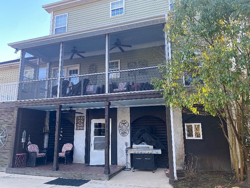 Screened Porch above patio - garage entrance and BBQ