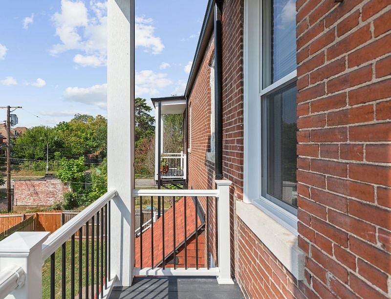 Covered balcony off of kitchen.