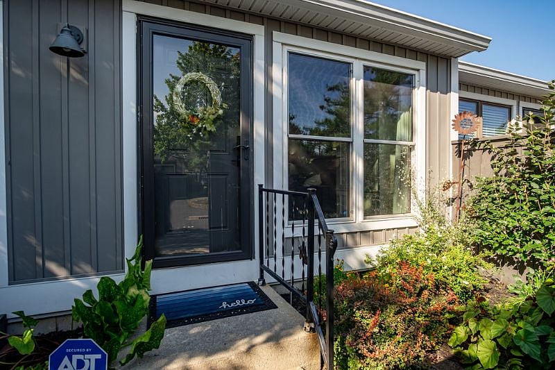 Front entrance with secret garden out your front windows.