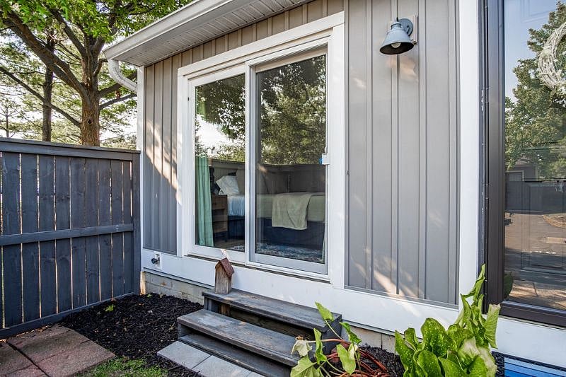 Front of condo with bedroom patio door.