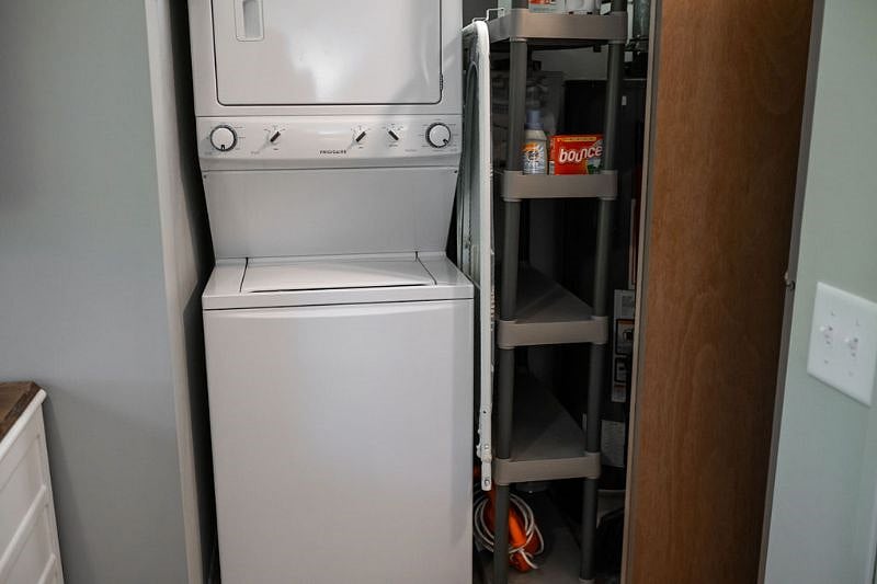 Washer & dryer access and utilities closet is in the rear bedroom.