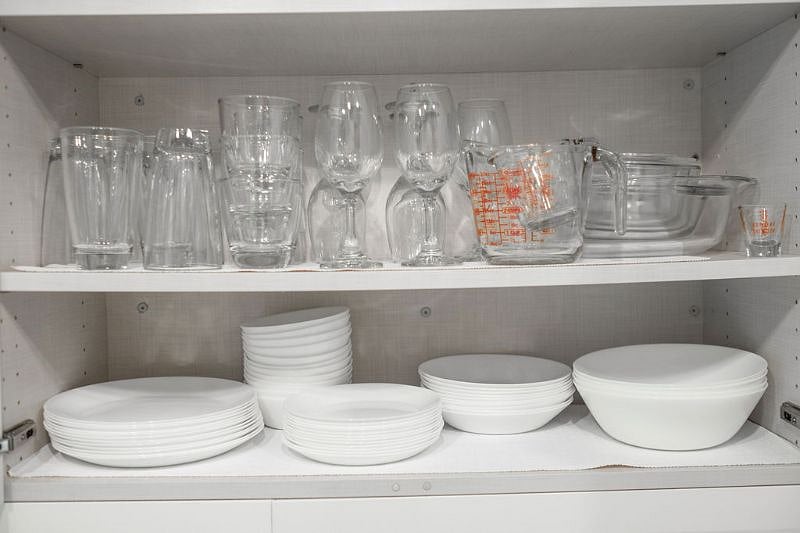 Dishes, glassware, casseroles, measuring cups.