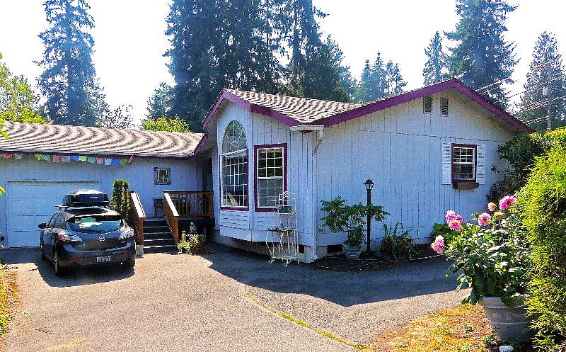 Front of house and deck.