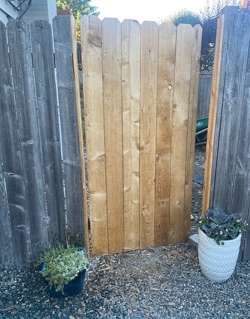 This is the cedar gate you open to enter the unit. There is a motion sensor light that will activate at dusk for safety.