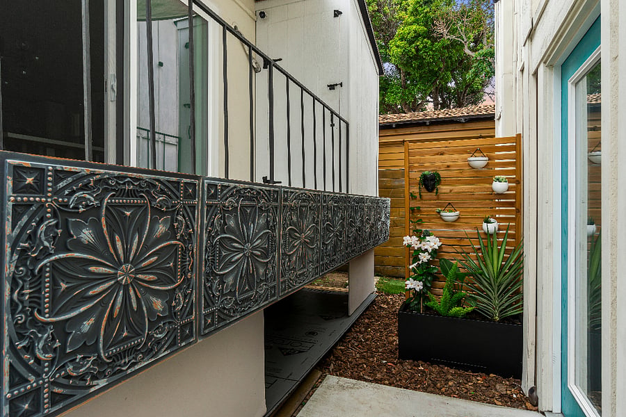 Outside storage across from entryway (4'x4'x24) Perfect for surfboards, paddle boards, kayaks, etc.