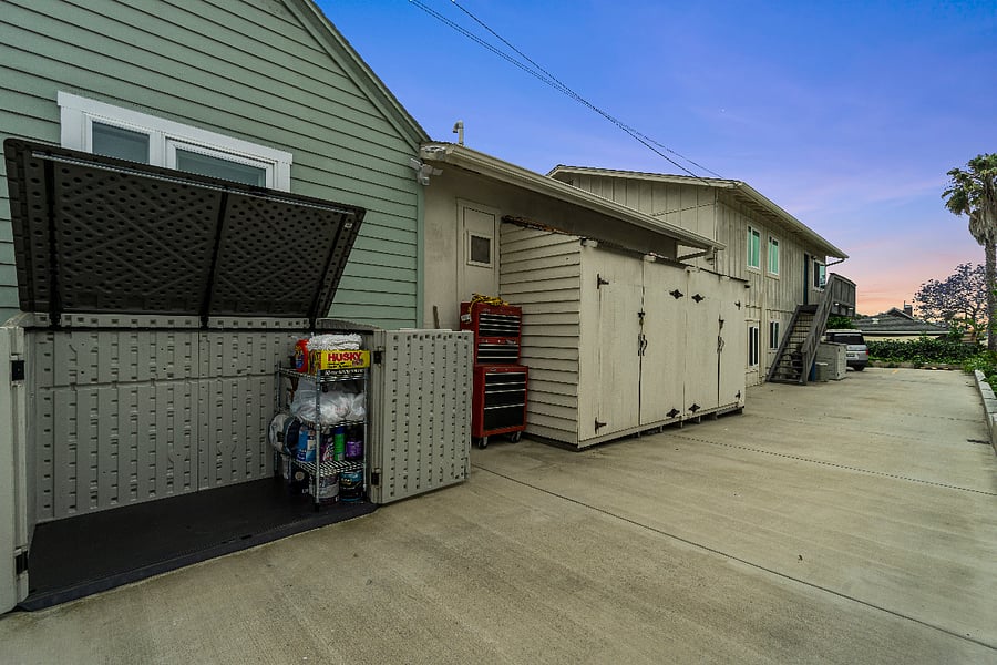 Second Additional Storage Space in driveway area (4'x4'x5') Perfect for storing bikes, boxes, golf clubs, etc. Secured with padlock.