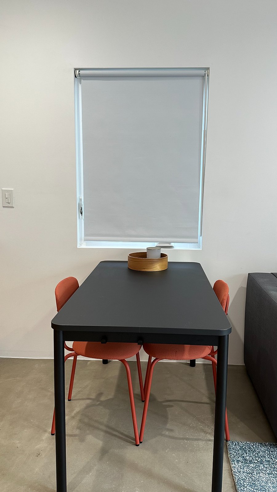 Windows have room-darkening blinds/curtains