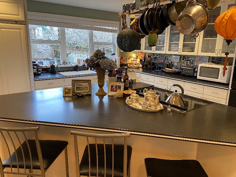 Kitchen has a large island with seating.